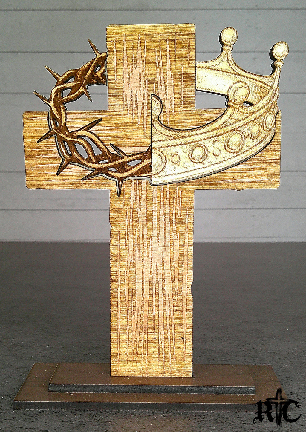 Wooden cross with a crown of thorns and a royal crown made to set on a desktop or shelf