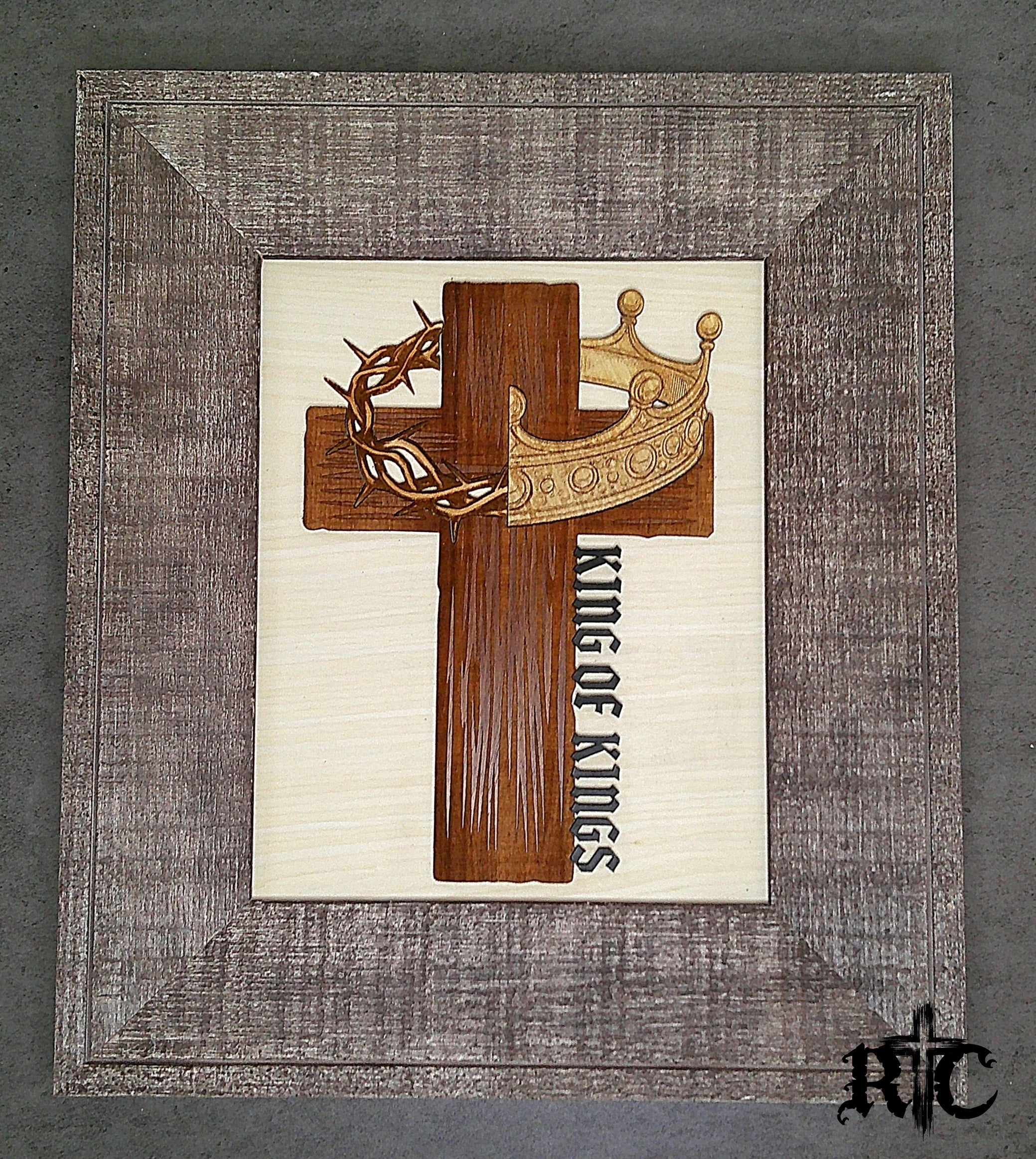 Wooden cross with crowns and 'King of Kings' inscription frame for wall decor